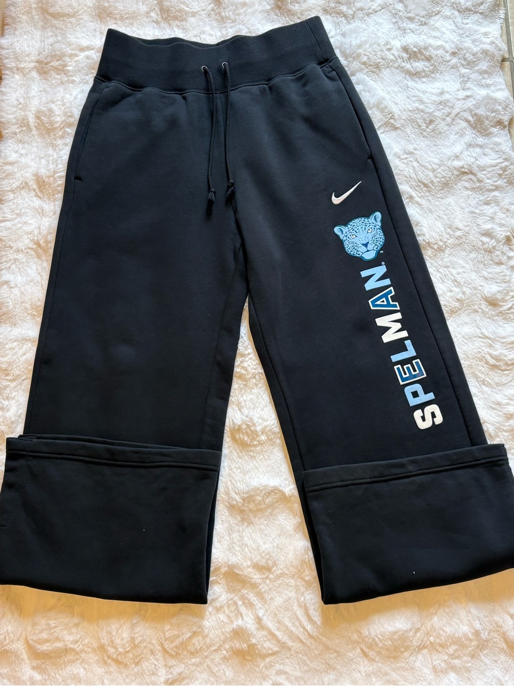 Nike Kids Black Sweatpants with Light Blue Spelman Logo